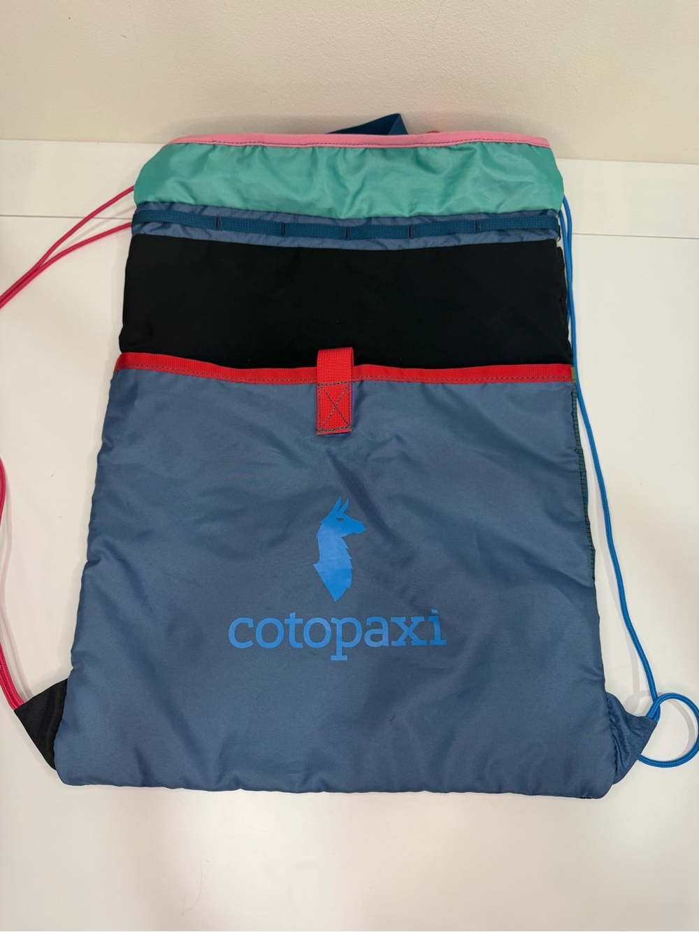 Cotopaxi Tago Drawstring Backpack Del Día Blue Multicolor Colorblock